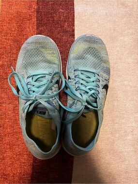 Nike Women's Teal/Light Blue Flyknit Running Shoes
